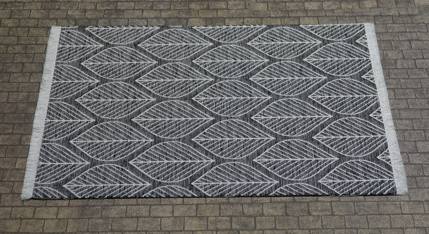 Matto harmaa lehtikuvioinen 1:6