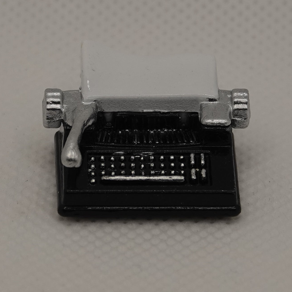 Kirjoituskone 1:12, musta
