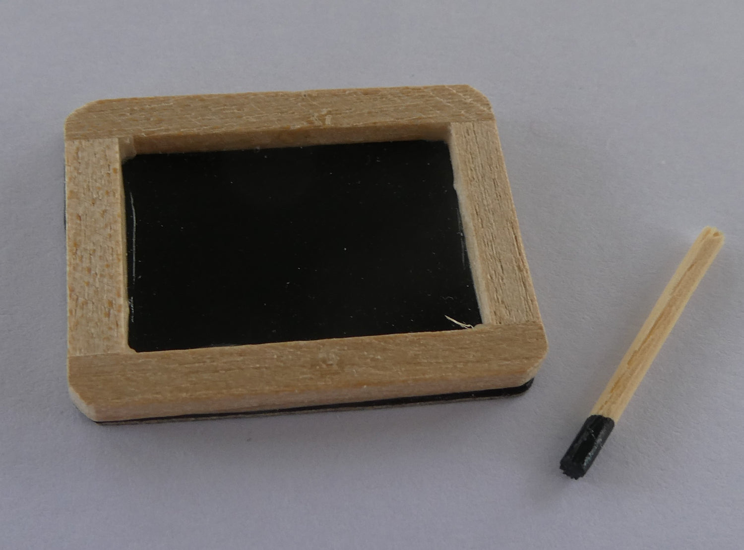 Nukkekodin liitutaulu