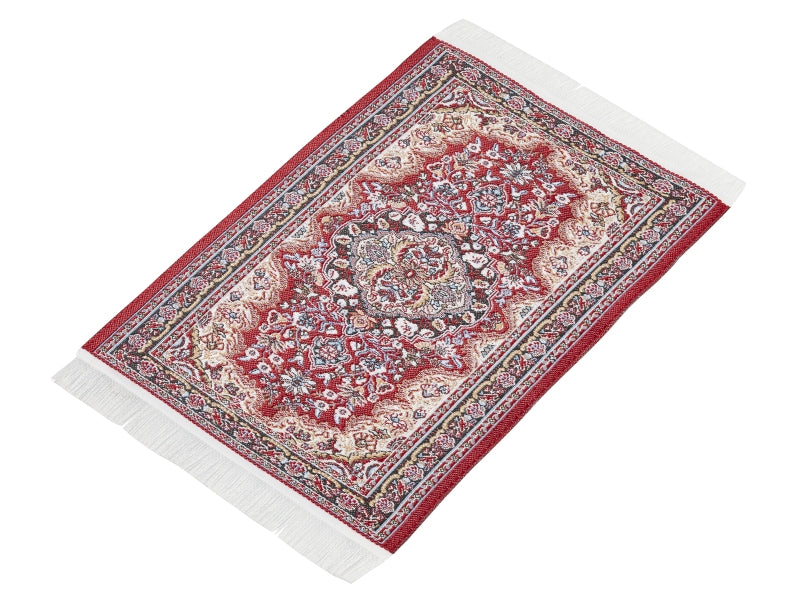 Kuviollinen nukkekodin matto hapsuilla