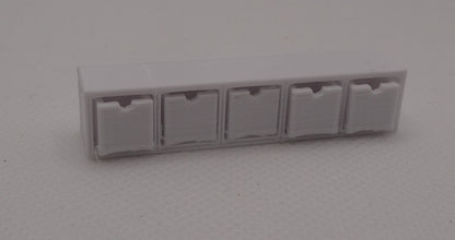 Maustelokerikko nukkekotiin, eri kokoja ja värejä