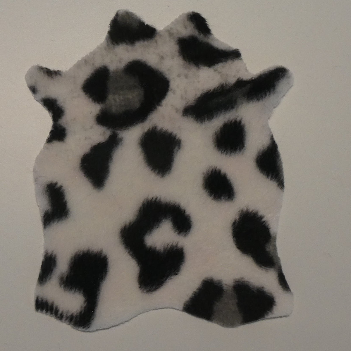 Talja nukkekotiin, lumileopardi